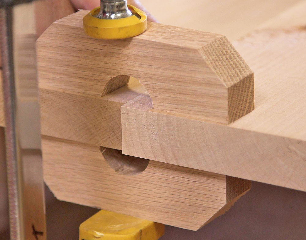 Clamp blocks force the boards to align perfectly to achieve a flat 