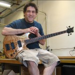 Tom Garden with one of his newest handmade basses featuring quilted maple and a sleek lightweight design and top of the line hardware