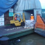 Loading a barge for transport to the ocean going vessel