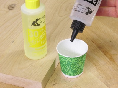In a small disposable mixing cup, mix your epoxy. The mix is usually 1:1 hardener to resin, but check the instructions on your epoxy